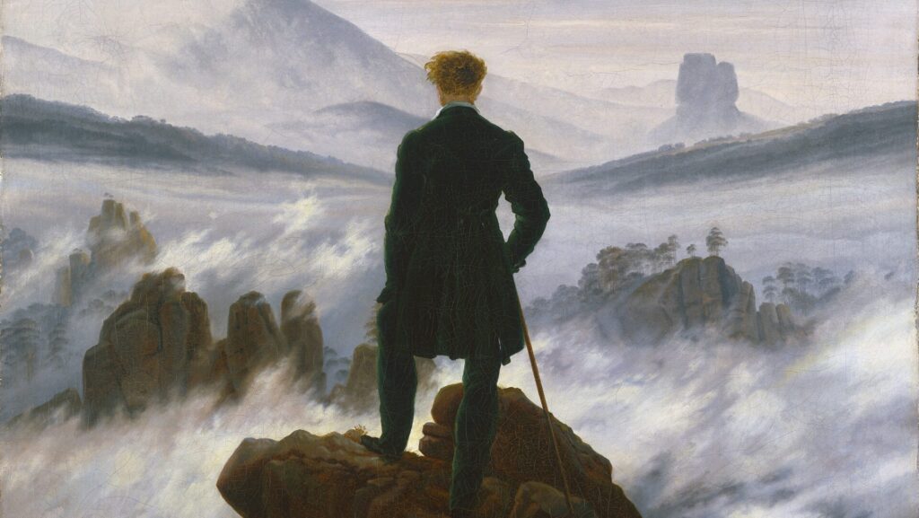 The hiker stands as a back figure in the center of the composition. He looks down on an almost impenetrable sea of ​​fog in the midst of a rocky landscape - a metaphor for life as an ominous journey into the unknown.