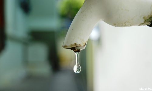 Water droplet on tap
